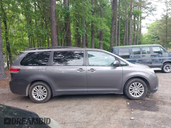 2011 Toyota Sienna XLE AAS with VIN 5TDYK3DC8BS016319, listed as a IAAI auction lot 42186294 with 293,401 mi miles and . Bid and sale history available at DreamBid. Image 13.