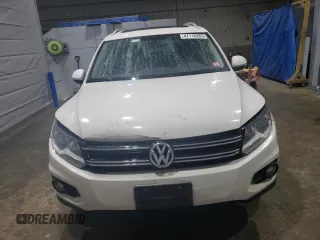 2013 Volkswagen Tiguan SEL with VIN WVGBV3AX2DW058147, listed as a Copart auction lot 47110285 with 156,145 mi miles and Salvage Title. Bid and sale history available at DreamBid. Image 5.