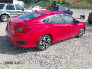 2016 Honda Civic EX-L z VIN 2HGFC1F74GH652090, wystawiony jako IAAI lot #42253881 z przebiegiem 127 863 mil mil oraz . Historia ofert i sprzedaży dostępna na DreamBid. Obrazek 4.