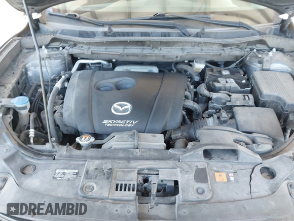 2016 Mazda CX-5 Sport with VIN JM3KE4BY1G0910102, listed as a IAAI auction lot 42115163 with 144,495 mi miles and . Bid and sale history available at carsss.com. Image 10.