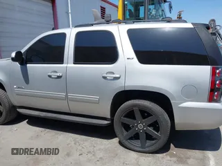2010 GMC Yukon SLT with VIN 1GKUCCE00AR255901, listed as a IAAI auction lot 41967877 with 195,969 mi miles. Bid and sale history available at carsss.com. Image 14.