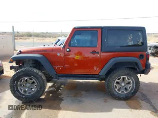 2014 Jeep Wrangler Rubicon with VIN 1C4BJWCG8EL185597, listed as a IAAI auction lot 41914489 with 85,545 mi miles and . Bid and sale history available at DreamBid. Image 14.