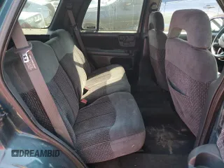 1996 GMC Jimmy SL with VIN 1GKCS13W0T2553905, listed as a Copart auction lot 71007674 with 169,513 mi miles and Salvage Title. Bid and sale history available at carsss.com. Image 10.