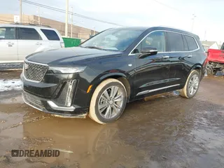 2025 Cadillac XT6 FWD Premium Luxury with VIN 1GYKPCRS6SZ104902, listed as a IAAI auction lot 41565224 with 4,735 mi miles and . Bid and sale history available at DreamBid. Image 18.