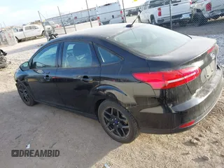 2016 Ford Focus SE z VIN 1FADP3FEXGL310270, wystawiony jako IAAI lot #40956503 z przebiegiem 156 812 mil mil oraz . Historia ofert i sprzedaży dostępna na DreamBid. Obrazek 15.