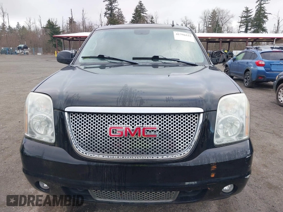 2011 GMC Yukon Denali with VIN 1GKS2EEF9BR261336, listed as a IAAI auction lot 41796533 with 149,808 mi miles. Bid and sale history available at carsss.com. Image 12.