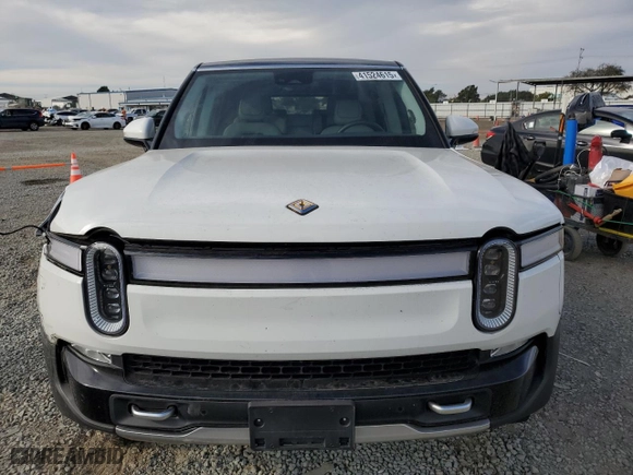 2024 Rivian R1S Adventure with VIN 7PDSGABA4RN043975, listed as a Copart auction lot 41524615 with 6,807 mi miles and Salvage Title. Bid and sale history available at carsss.com. Image 5.