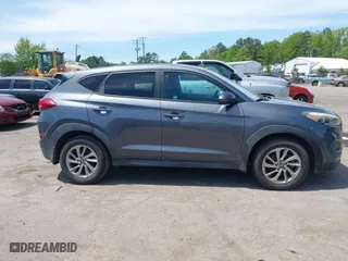 2016 Hyundai Tucson SE with VIN KM8J23A44GU119203, listed as a IAAI auction lot 42104002 with 139,797 mi miles. Bid and sale history available at carsss.com. Image 13.