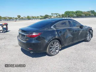 2020 Mazda 6 Touring with VIN JM1GL1VMXL1517828, listed as a IAAI auction lot 41511804 with 123,174 mi miles. Bid and sale history available at carsss.com. Image 4.