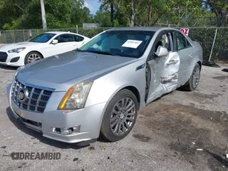2012 Cadillac CTS with VIN 1G6DM5E37C0126305, listed as a IAAI auction lot 42001466 with 150,566 mi miles and . Bid and sale history available at DreamBid. Image 2.