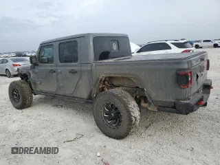 2020 Jeep Gladiator Rubicon z VIN 1C6JJTBG9LL150356, wystawiony jako Copart lot #50449445 z przebiegiem 77 849 mil mil oraz Szkoda całkowita • Salvage title. Historia ofert i sprzedaży dostępna na DreamBid. Obrazek 2.