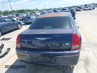 2005 Chrysler 300 with VIN 2C3JA53G25H167944, listed as a IAAI auction lot 41963114 with 196,635 mi miles. Bid and sale history available at carsss.com. Image 17.