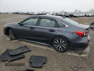 2024 Honda Civic EX z VIN 2HGFE1F79RH336732, wystawiony jako Copart lot #43025295 z przebiegiem 5 468 mil mil oraz Szkoda całkowita • Salvage title. Historia ofert i sprzedaży dostępna na DreamBid. Obrazek 2.