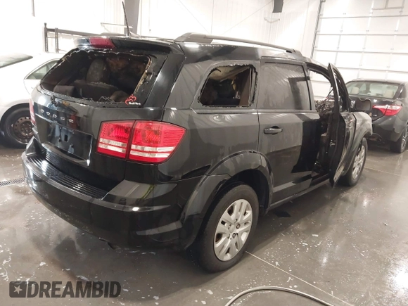 2018 Dodge Journey SE with VIN 3C4PDCAB8JT518673, listed as a IAAI auction lot 41689200 with Not Provided miles. Bid and sale history available at carsss.com. Image 4.