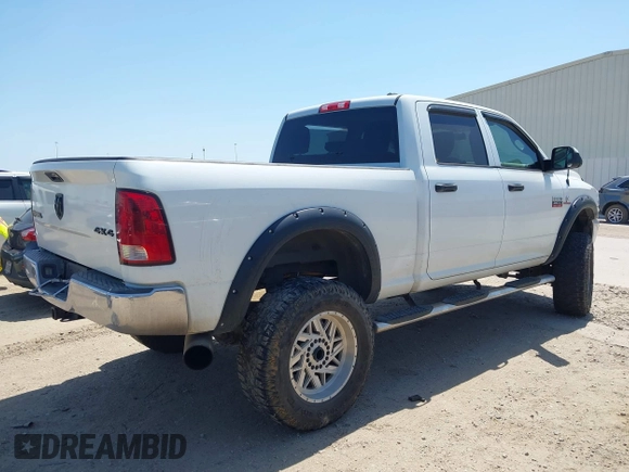 2012 Ram 2500 ST z VIN 3C6UD5CLXCG301343, wystawiony jako IAAI lot #42009239 z przebiegiem 139 514 mil mil oraz . Historia ofert i sprzedaży dostępna na DreamBid. Obrazek 4.