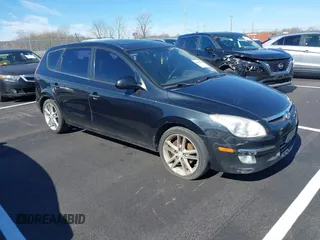 2009 Hyundai Elantra Touring z VIN KMHDC86EX9U048875, wystawiony jako IAAI lot #41828722 z przebiegiem 211 950 mil mil oraz . Historia ofert i sprzedaży dostępna na DreamBid. Obrazek 1.