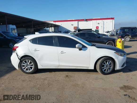 2014 Mazda 3 i Grand Touring with VIN JM1BM1M7XE1102093, listed as a IAAI auction lot 41344433 with 148,395 mi miles and . Bid and sale history available at DreamBid. Image 13.