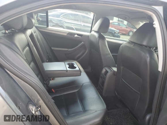2014 Volkswagen Jetta TDI w/Premium with VIN 3VWLL7AJ4EM374570, listed as a Copart auction lot 63996195 with 186,497 mi miles and Salvage title. Bid and sale history available at DreamBid. Image 10.