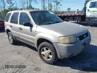 2001 Ford Escape XLT with VIN 1FMYU03141KE84977, listed as a IAAI auction lot 41773564 with 291,773 mi miles. Bid and sale history available at carsss.com. Image 1.