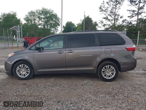 2016 Toyota Sienna XLE with VIN 5TDYK3DC8GS721290, listed as a IAAI auction lot 42127035 with 142,150 mi miles and . Bid and sale history available at DreamBid. Image 14.