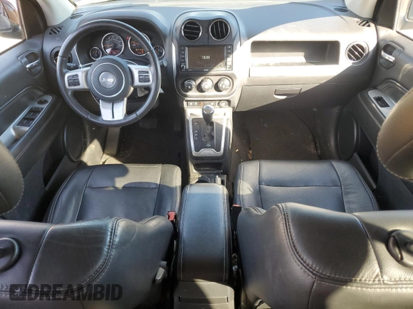 2015 Jeep Compass Limited with VIN 1C4NJDCB7FD177170, listed as a Copart auction lot 87464674 with 77,212 mi miles and Salvage Title. Bid and sale history available at carsss.com. Image 8.