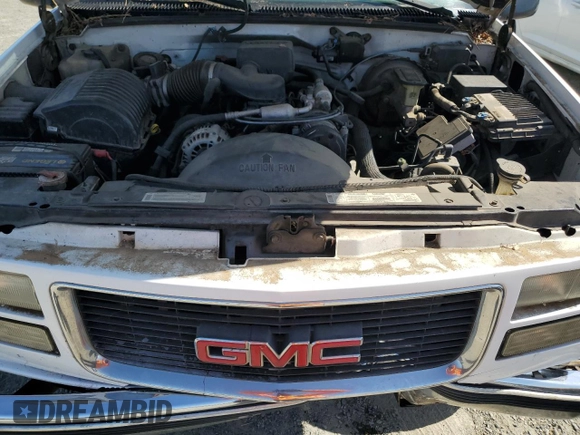 1999 GMC Sierra 1500 z VIN 1GTGC24RXXR721667, wystawiony jako Copart lot #58575985 z przebiegiem 201 752 mil mil oraz Czysty tytuł • Clean title. Historia ofert i sprzedaży dostępna na DreamBid. Obrazek 11.