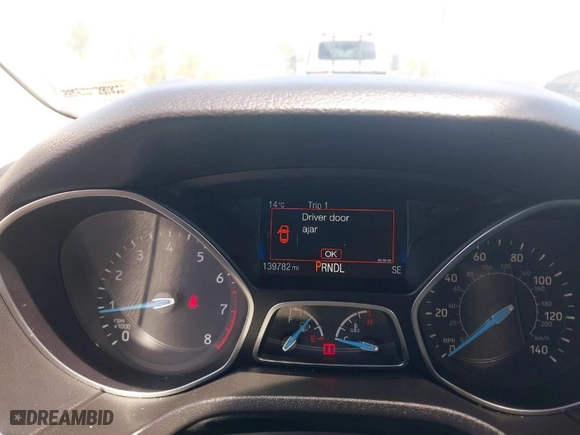 2015 Ford Focus SE with VIN 1FADP3K21FL246601, listed as a IAAI auction lot 41985398 with 139,782 mi miles. Bid and sale history available at carsss.com. Image 7.