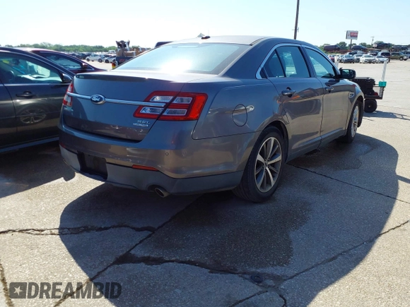 2013 Ford Taurus SEL with VIN 1FAHP2E81DG229444, listed as a IAAI auction lot 42095216 with 211,812 mi miles and . Bid and sale history available at carsss.com. Image 4.