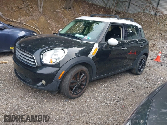 2012 MINI Countryman with VIN WMWZB3C5XCWM30191, listed as a IAAI auction lot 42435291 with 103,254 mi miles and . Bid and sale history available at DreamBid. Image 2.