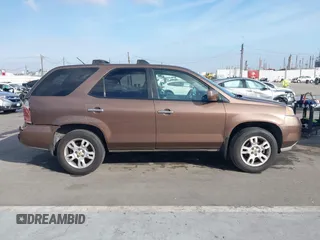 2004 Acura MDX Touring Pkg w/Navigation with VIN 2HNYD18854H511500, listed as a IAAI auction lot 41581417 with 223,757 mi miles. Bid and sale history available at carsss.com. Image 13.