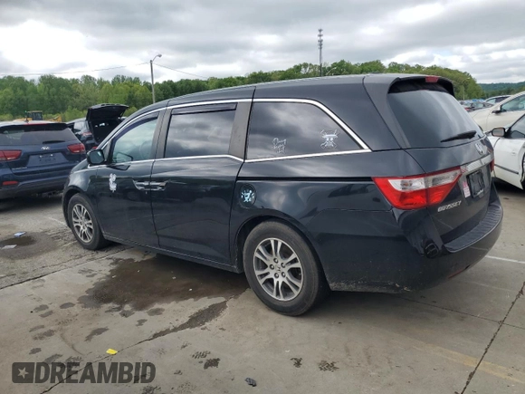 2013 Honda Odyssey EX-L with VIN 5FNRL5H61DB019930, listed as a Copart auction lot 54666775 with 175,300 mi miles and Salvage title. Bid and sale history available at DreamBid. Image 2.