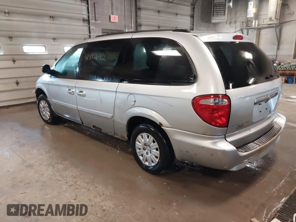 2007 Chrysler Town & Country LWB LX with VIN 2A4GP44R47R354107, listed as a IAAI auction lot 41982682 with 200,643 mi miles. Bid and sale history available at carsss.com. Image 3.