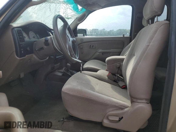 2002 Toyota Tacoma with VIN 5TEWM72N12Z093226, listed as a Copart auction lot 61019955 with 103,657 mi miles and Clean title. Bid and sale history available at DreamBid. Image 7.