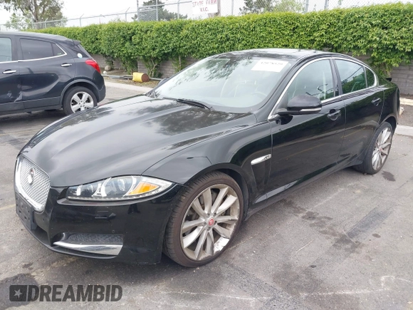 2015 Jaguar XF V6 Portfolio with VIN SAJWA0F77F8U65737, listed as a IAAI auction lot 42078529 with 62,229 mi miles. Bid and sale history available at carsss.com. Image 2.