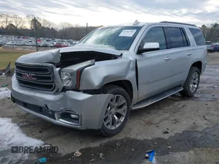 2016 GMC Yukon SLE with VIN 1GKS2AKC0GR332224, listed as a IAAI auction lot 41301706 with 108,340 mi miles. Bid and sale history available at carsss.com. Image 2.