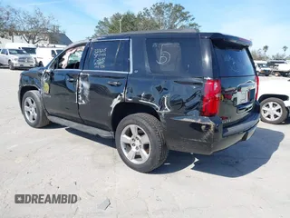 2018 Chevrolet Tahoe LT with VIN 1GNSCBKCXJR132867, listed as a IAAI auction lot 41456319 with 59,131 mi miles and . Bid and sale history available at DreamBid. Image 3.