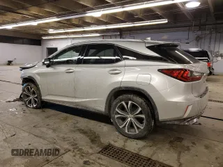 2016 Lexus RX 450h with VIN 2T2BGMCA2GC001405, listed as a Copart auction lot 45579795 with 129,086 mi miles and Salvage title. Bid and sale history available at DreamBid. Image 2.
