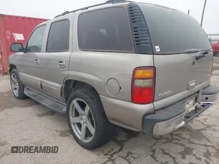 2003 GMC Yukon SLT with VIN 1GKEC13V33J287668, listed as a IAAI auction lot 41561108 with 326,719 mi miles. Bid and sale history available at carsss.com. Image 3.