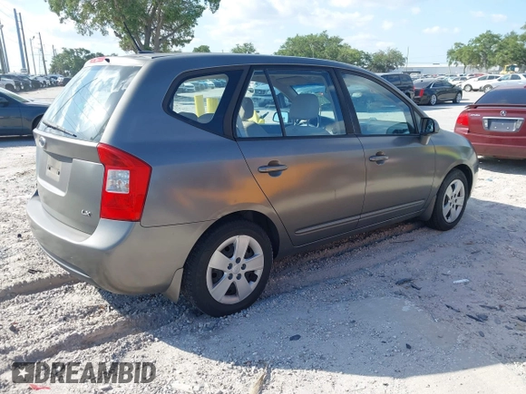 2009 Kia Rondo LX with VIN KNAFG528797267899, listed as a IAAI auction lot 42020740 with 141,113 mi miles. Bid and sale history available at carsss.com. Image 4.