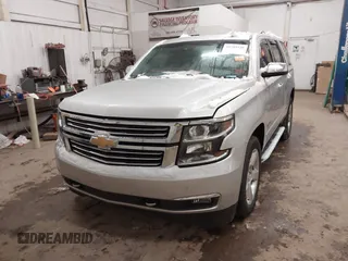 2016 Chevrolet Tahoe LTZ z VIN 1GNSKCKCXGR284827, wystawiony jako IAAI lot #41389540 z przebiegiem 93 150 mil mil oraz . Historia ofert i sprzedaży dostępna na DreamBid. Obrazek 2.