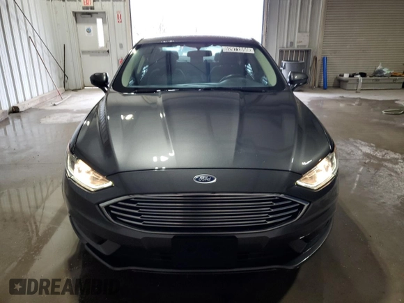 2018 Ford Fusion SE z VIN 3FA6P0H79JR111709, wystawiony jako Copart lot #52972855 z przebiegiem 116 442 mil mil oraz Czysty tytuł • Clean title. Historia ofert i sprzedaży dostępna na DreamBid. Obrazek 5.
