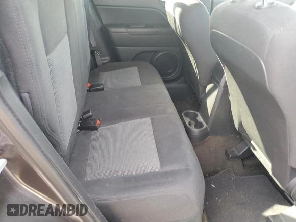 2015 Jeep Patriot Latitude with VIN 1C4NJPFBXFD281214, listed as a Copart auction lot 87883615 with 106,402 mi miles and Salvage Title. Bid and sale history available at DreamBid. Image 11.
