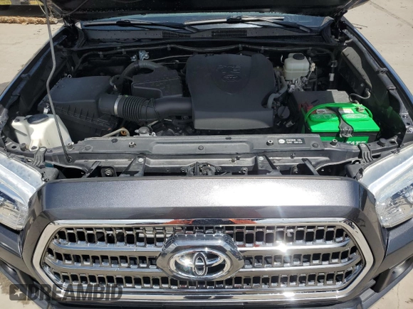 2017 Toyota Tacoma SR5 z VIN 3TMCZ5AN6HM060416, wystawiony jako Copart lot #56697175 z przebiegiem 120 029 mil mil oraz Szkoda całkowita • Salvage title. Historia ofert i sprzedaży dostępna na DreamBid. Obrazek 11.