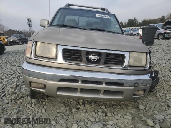 2000 Nissan Frontier XE with VIN 1N6ED27Y3YC366060, listed as a Copart auction lot 48955585 with 158,565 mi miles and Salvage title. Bid and sale history available at DreamBid. Image 5.