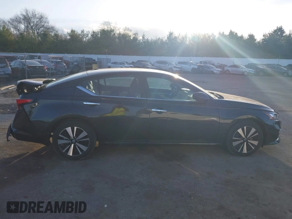 2021 Nissan Altima SV with VIN 1N4BL4DV5MN410885, listed as a IAAI auction lot 41809083 with 61,362 mi miles and . Bid and sale history available at DreamBid. Image 13.