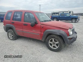 2003 Jeep Liberty Sport with VIN 1J4GL48K53W515414, listed as a Copart auction lot 47820045 with 142,002 mi miles and Salvage Title. Bid and sale history available at DreamBid. Image 4.