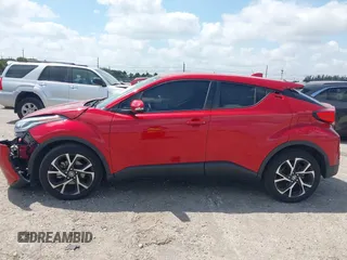 2022 Toyota C-HR XLE z VIN NMTKHMBX4NR141627, wystawiony jako IAAI lot #42108475 z przebiegiem 49 564 mil mil oraz . Historia ofert i sprzedaży dostępna na DreamBid. Obrazek 14.
