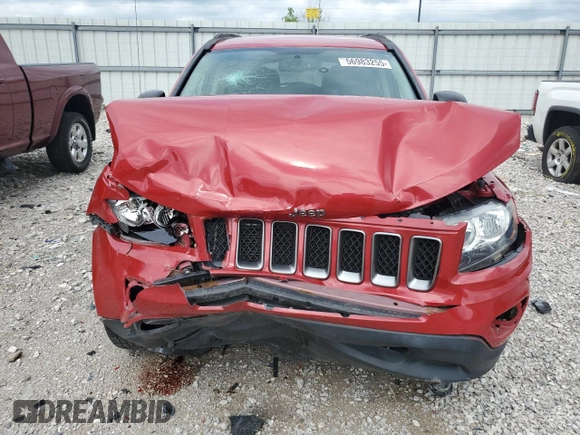 2016 Jeep Compass Sport SE with VIN 1C4NJDBB0GD759999, listed as a Copart auction lot 56983255 with 69,548 mi miles and Salvage title. Bid and sale history available at DreamBid. Image 5.