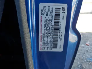 1992 Mitsubishi Mighty Max z VIN JA7FL24W9NP015815, wystawiony jako Copart lot #79803754 z przebiegiem 170 580 mil mil oraz Szkody całkowita. Historia ofert i sprzedaży dostępna na DreamBid. Obrazek 14.