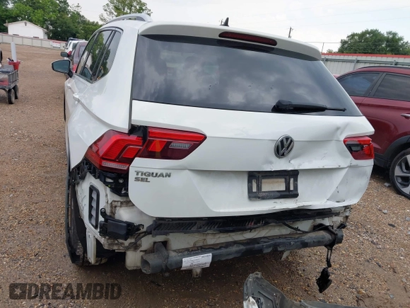 2019 Volkswagen Tiguan SE with VIN 3VV3B7AX6KM018161, listed as a IAAI auction lot 42279398 with 96,534 mi miles and . Bid and sale history available at DreamBid. Image 6.